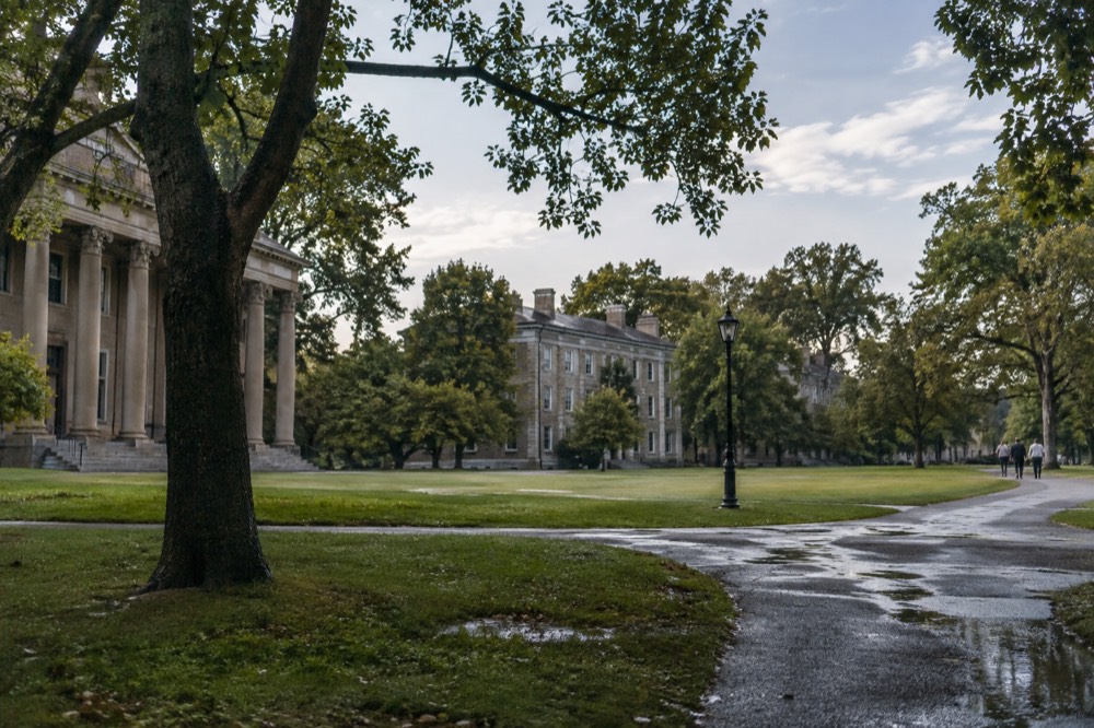 Historic Greek Revival buildings on the Snug Harbor campus with lawns in front