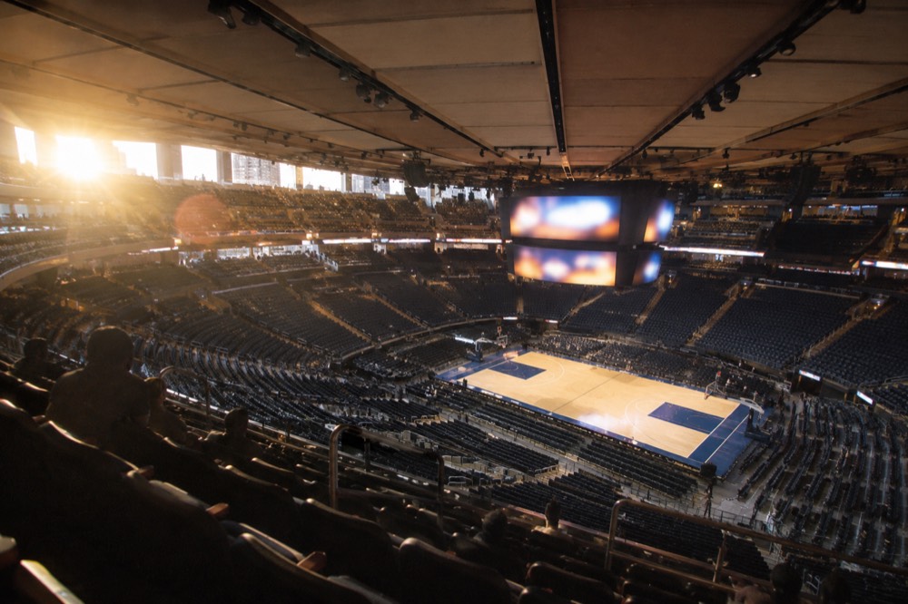 A wide view of the Madison Square Garden seating bowl from the upper level during a quiet morning