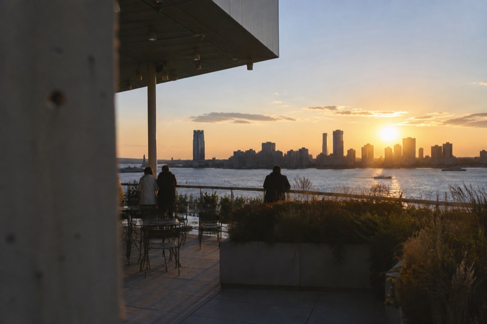 Evening light over the Hudson River seen from a Whitney Museum sculpture terrace