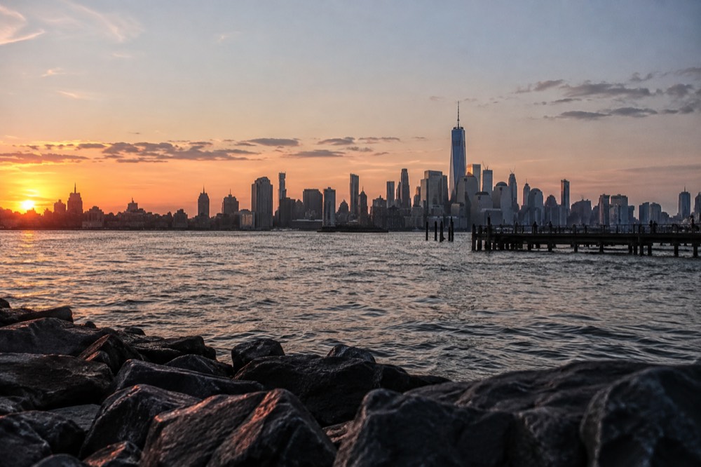 The Manhattan skyline at dusk seen from across the water