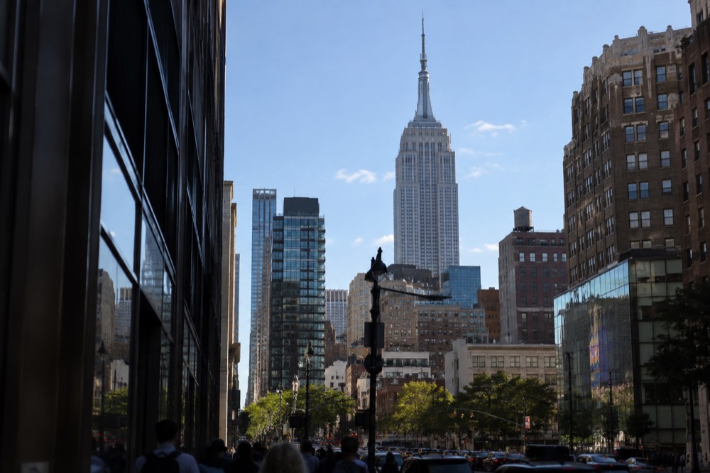 The Empire State Building rising above Midtown rooftops