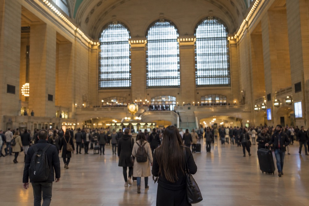Grand Central Terminal main concourse with travelers under its vaulted celestial ceiling